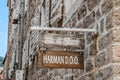 Vintage wooden signs of shops in the Old Town of Budva