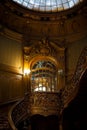 Vintage wooden spiral staircase. House of Scientists in Lviv