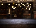 Vintage wooden table on blurred cafe background dining room restaurant Royalty Free Stock Photo