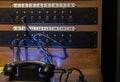 A vintage wooden telephone switchboard Royalty Free Stock Photo