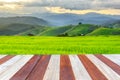 Vintage wooden texture with blurred rice field background Royalty Free Stock Photo