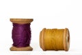 Vintage wooden thread spools on white background Royalty Free Stock Photo