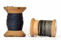 Vintage wooden thread spools on white background Royalty Free Stock Photo