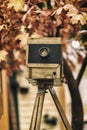 Vintage wooden view photocamera and tripod. Cocept retro, nostalgia and time Royalty Free Stock Photo