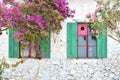 Vintage wooden window frames in authentic mediterranean house.