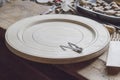 Vintage woodworking tools and wooden unfinished plate, on a workbench, dust and shavings: carpentry, craftsmanship and handwork Royalty Free Stock Photo