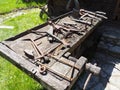 vintage working tools on a wooden table. Wooden and metal tools for building and rural life. Hammer, bracket, saw, ax Royalty Free Stock Photo