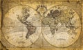 Vintage world map on an old stained parchment Royalty Free Stock Photo