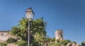 Vintage wrought iron floor lamp in the small town center of Saint Emilion Royalty Free Stock Photo