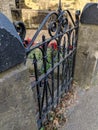 Vintage wrought iron garden gate, painted black.