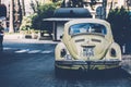 Vintage yellow beetle parked along the street in Cartagena, Spain Royalty Free Stock Photo