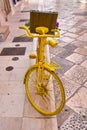 Vintage Yellow Bike Serving As A Decoration In An Italian Street Royalty Free Stock Photo