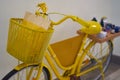 Vintage yellow bike stands in the showroom, design Royalty Free Stock Photo