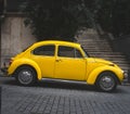 vintage yellow car parked outdoors. retro style. antique vehicle Royalty Free Stock Photo