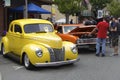 Vintage Yellow Ford and red Chevrolet