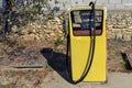 Vintage yellow gas pump Royalty Free Stock Photo