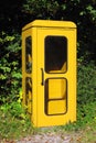 vintage yellow german phone box