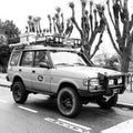 Vintage yellow Land Rover Defender Camel Trophy