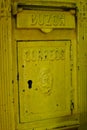 Vintage yellow mail box Royalty Free Stock Photo