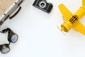 vintage yellow toy plane, old photo camera, pilot glasses Royalty Free Stock Photo