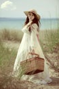 Vintage young lady going for picnic