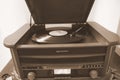 Vinyl disc played on old retro vintage device Royalty Free Stock Photo