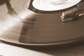 Vinyl disc played on old retro vintage device Royalty Free Stock Photo