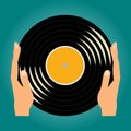 Hands holding a Vinyl music record Royalty Free Stock Photo