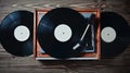 Vinyl player with plates on a wooden table. Entertainment 70s. Listen to music. Royalty Free Stock Photo