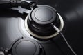 Vinyl record with black headphones close-up Royalty Free Stock Photo