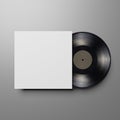 Vinyl record with blank cover on gray background. Mock up template Royalty Free Stock Photo