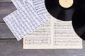 Vinyl records with music sheet scores.