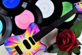 Vinyl round records, rose flower Queen, guitar for inspiration-retro background music for club discos. Record, vintage audio media