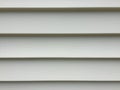 Vinyl siding on a white house Royalty Free Stock Photo