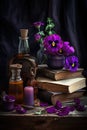 viola flowers with ancient books Royalty Free Stock Photo