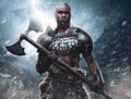 Violent african viking with axe in background of blizzard mountains Royalty Free Stock Photo