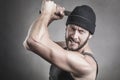 Violent man using a spanner or wrench as a weapon Royalty Free Stock Photo