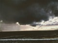 Violent sea thunder storm with windy rain and rolling waves. Royalty Free Stock Photo