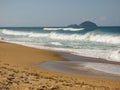 Violent waves at Mocambique beach on a sunny day - Florianopolis, Brazil