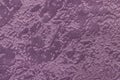 Violet background from a soft upholstery textile material, closeup. Royalty Free Stock Photo