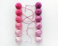 Violet balls of yarn  on white background Royalty Free Stock Photo