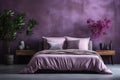 violet bedroom, purple walls and purple bedding, front view of a sleeping bed in the room.