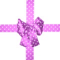 Violet bow and ribbon with white polka dots made from silk Royalty Free Stock Photo