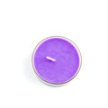 Violet candle isolated on a white background Royalty Free Stock Photo