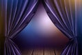 Violet curtains in theater with dramatic light