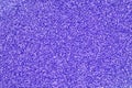 Violet decorative sequins. Background image with shiny bokeh lights from small elements Royalty Free Stock Photo