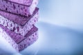 Violet dishwashing sponges on white background Royalty Free Stock Photo