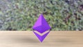 Violet Ethereum gold sign icon on wood table on leaves background. 3d render isolated illustration, cryptocurrency, crypto,