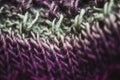 violet and green wool scarf knitted texture closeup macro Royalty Free Stock Photo