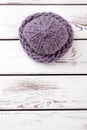 Violet knitted women`s hat.